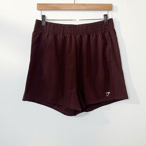 Gymshark women’s brown purplish pull on active running shorts